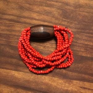 Red beaded and wooden bracelet